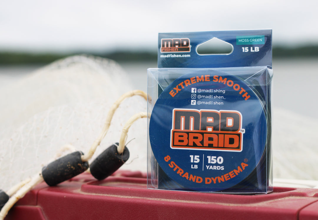 Mad Braid braided fishing line in original packaging, featuring 15lb 150-yard 8-strand Dyneema for ultimate casting and sensitivity.